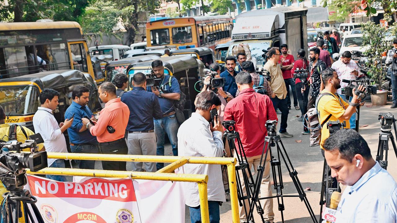 Media persons throng Bandra police station after the detention of a suspect in the case on Friday. Pic/Satej Shinde
