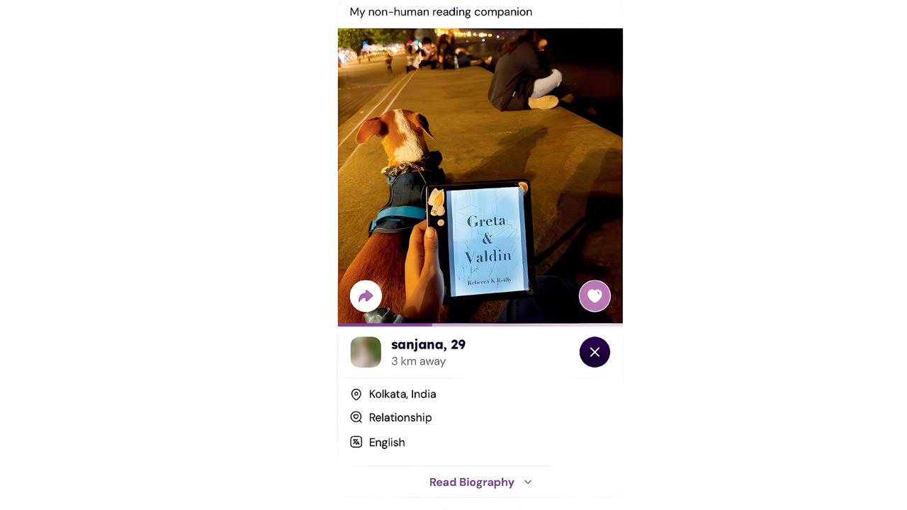 A user shares a picture of the book they are reading on the app