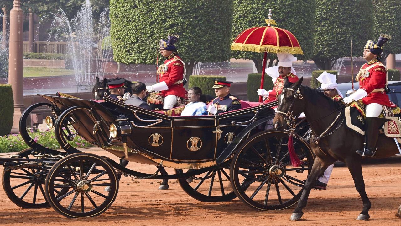 President Droupadi Murmu leaves from Rashtrapati Bhavan for the Parliament House on the first day of the Budget session, in New Delhi