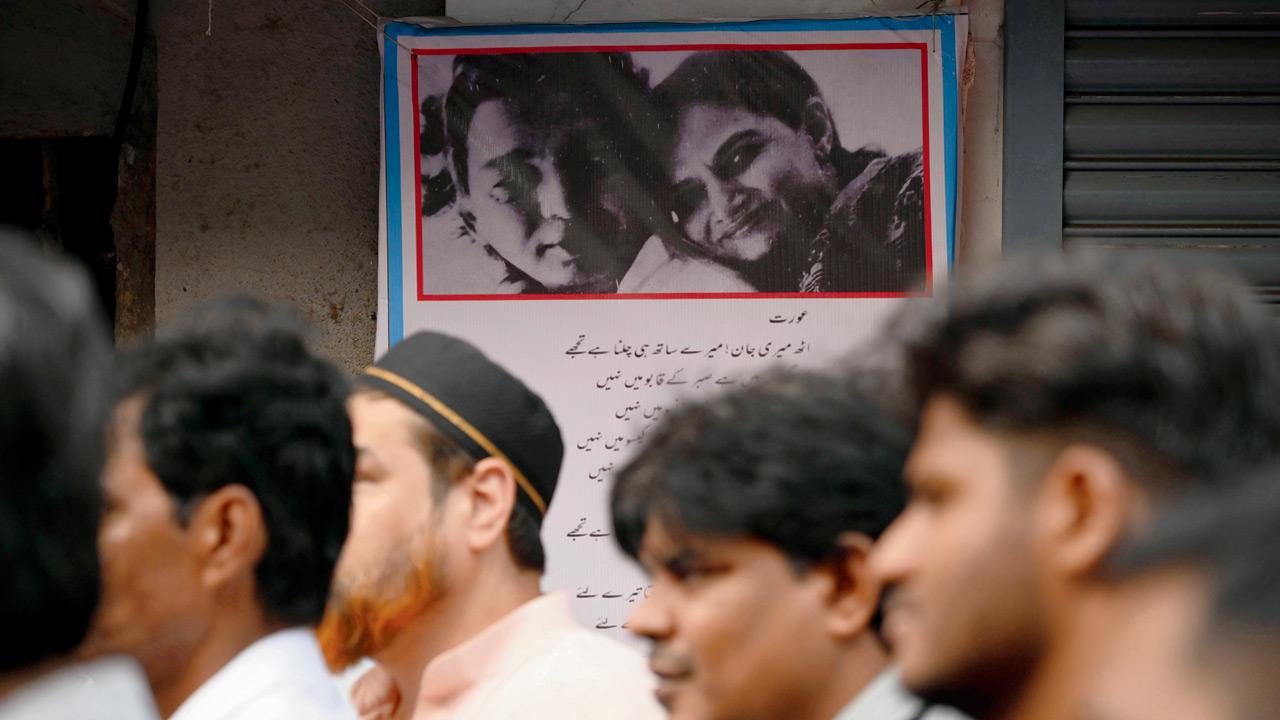 A poster of Kaifi Azmi with wife, Shaukat Kaifi, alongside the verses from his poem, Aurat