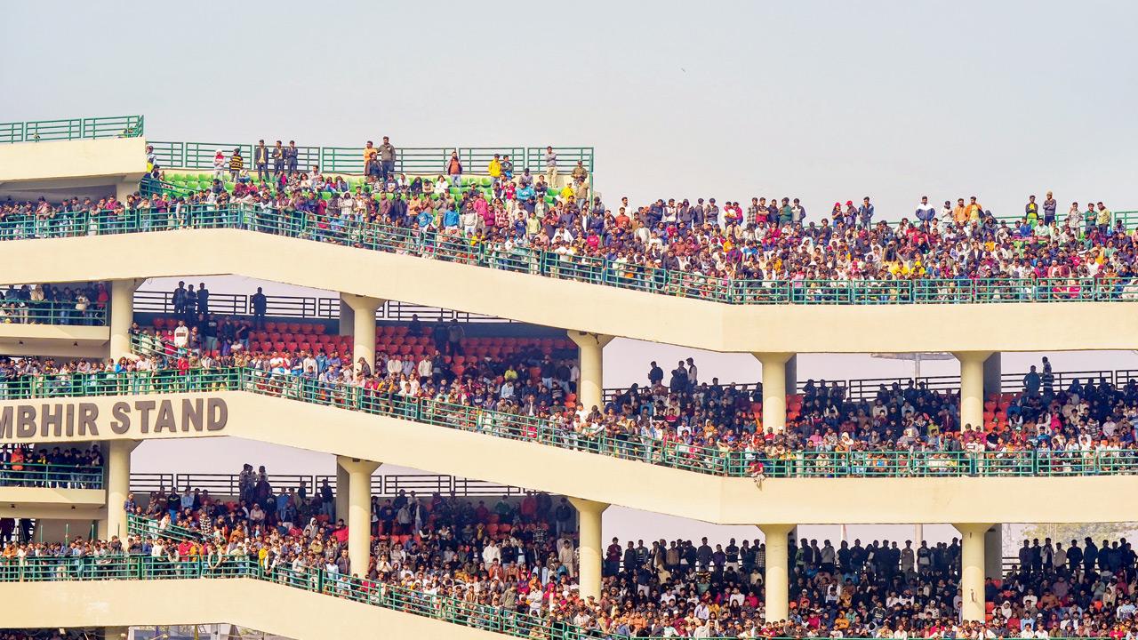 Spectators throng the Gautam Gambhir Stand at the Kotla for Day One of the Ranji Trophy game between hosts Delhi and Railways. Pics/PTI
