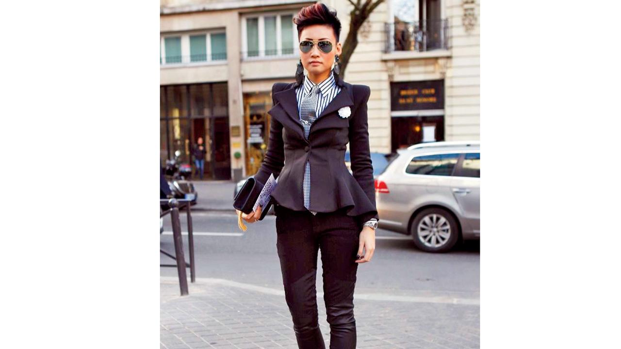 A cinched waist can offset the masculinity of a tie
