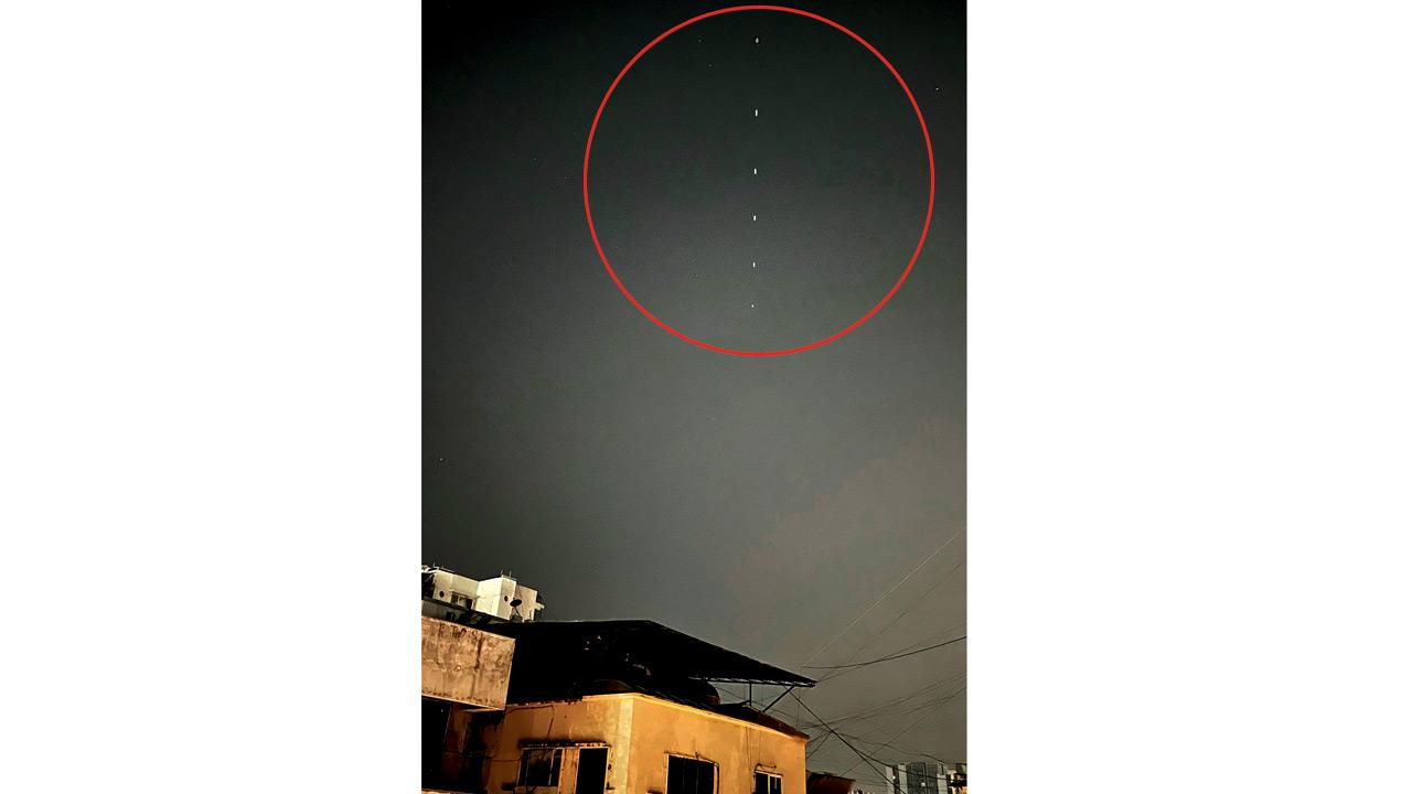 The fly-by of the ISS (inset, enlarged) captured through a series of images in Khar