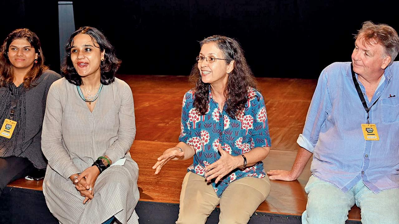 Shernaz Patel (centre) with her team during a workshop 