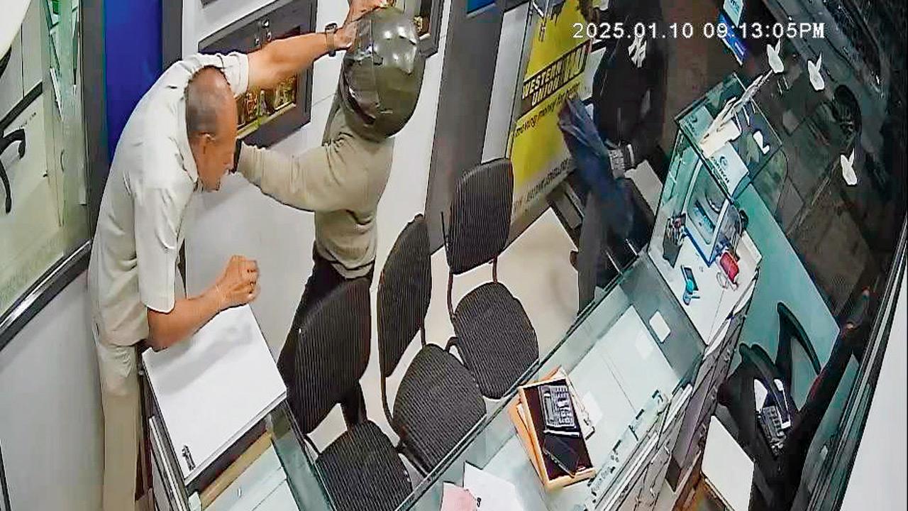 The burglar assaulting the store owner with the butt of the gun