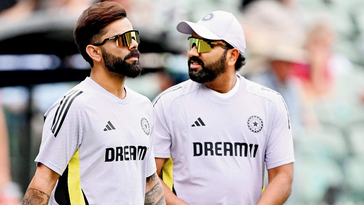 India’s Virat Kohli (left) and Rohit Sharma in Adelaide last month. Pic/AFP