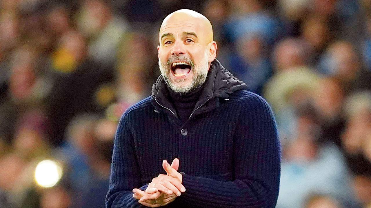 Man City’s Pep Guardiola urging his team on against Chelsea on Saturday. Pic/Getty Images