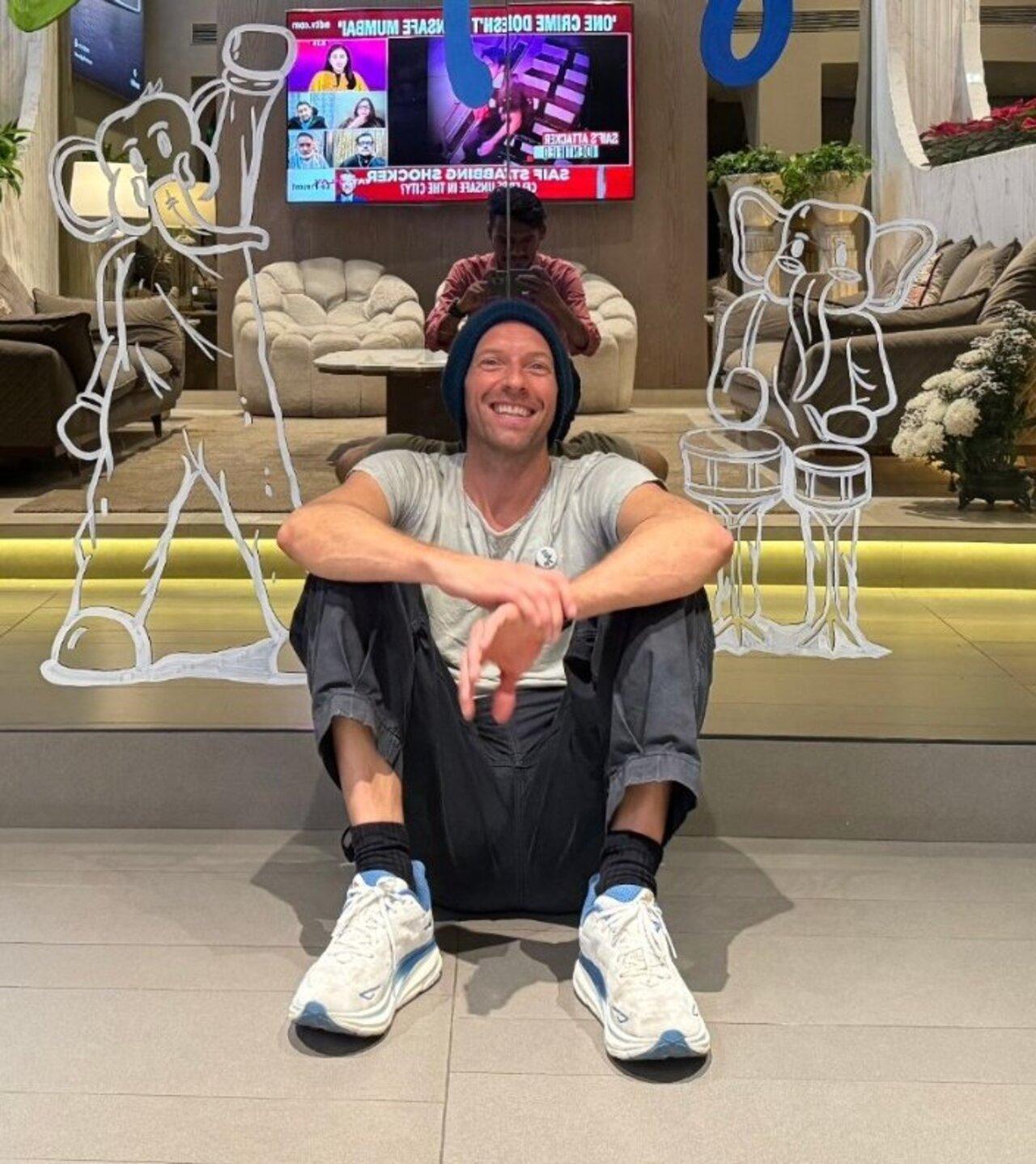 Chris was welcomed at a luxury hotel in Mumbai where he took a picture which had the background made with lyrics of his song Paradise.