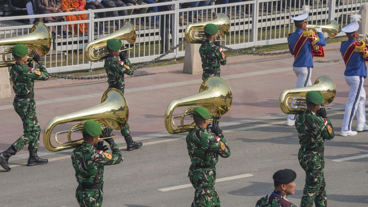 The band of the Indonesian contingent marches past during the full dress rehearsal for the Republic Day Parade 2025 at the Kartavya Path, in New Delhi