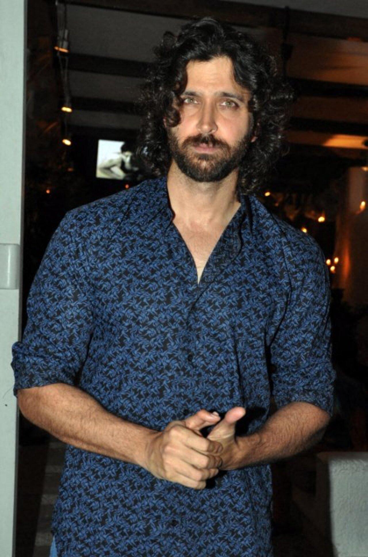 Hrithik Roshan flaunts his curly-haired look as he attends the launch of 'Celebrity Calendar 2010'.