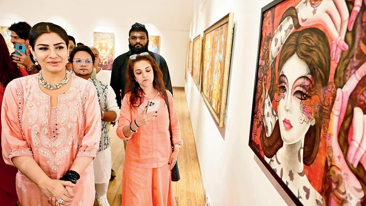 Up and about: Raveena admires creations on display at Jehangir Art Gallery