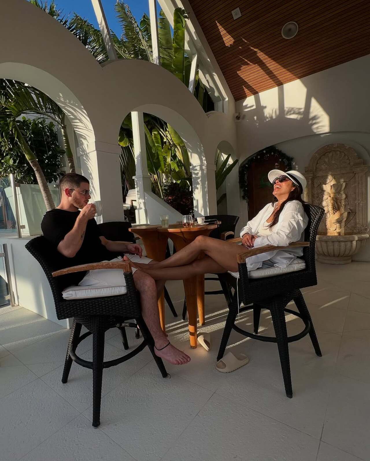 Priyanka and Nick relax and have a cup of coffee at their luxurious stay