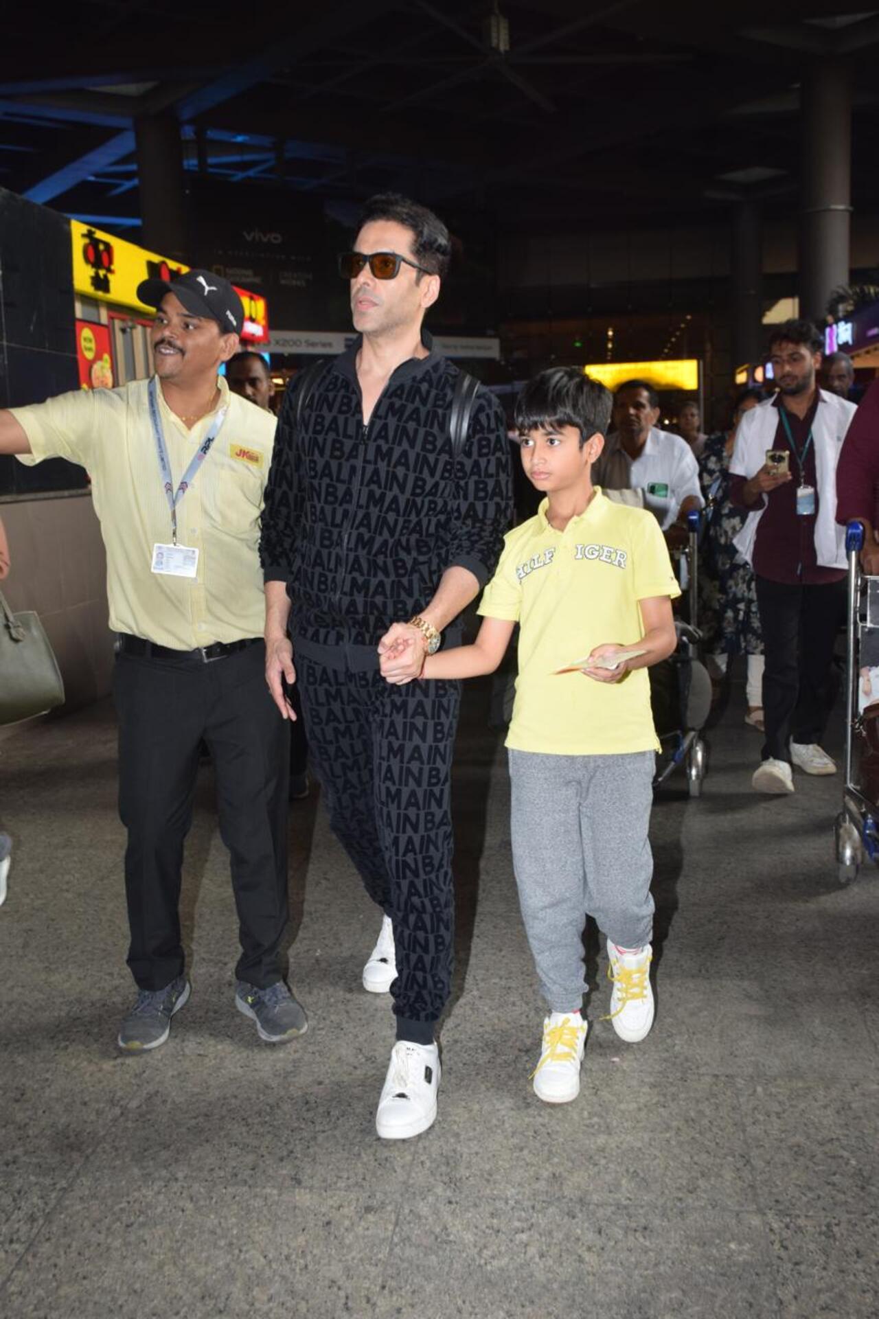 Tusshar Kapoor and his son Laksshya returned to Mumbai after their New Year vacay.