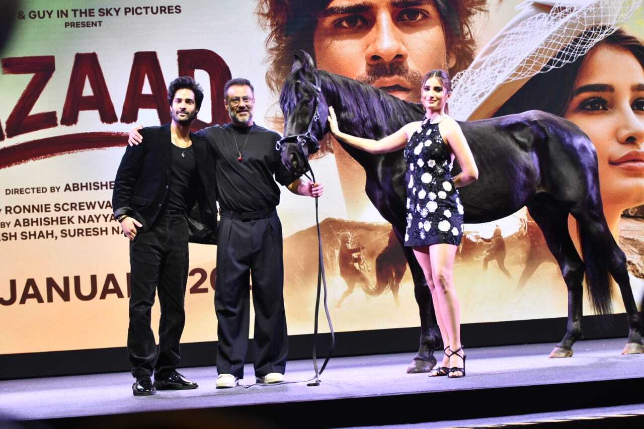 Rasha Thadani, Aaman Devgan pose with their director Abhishek Kapoor at Azaad trailer launch