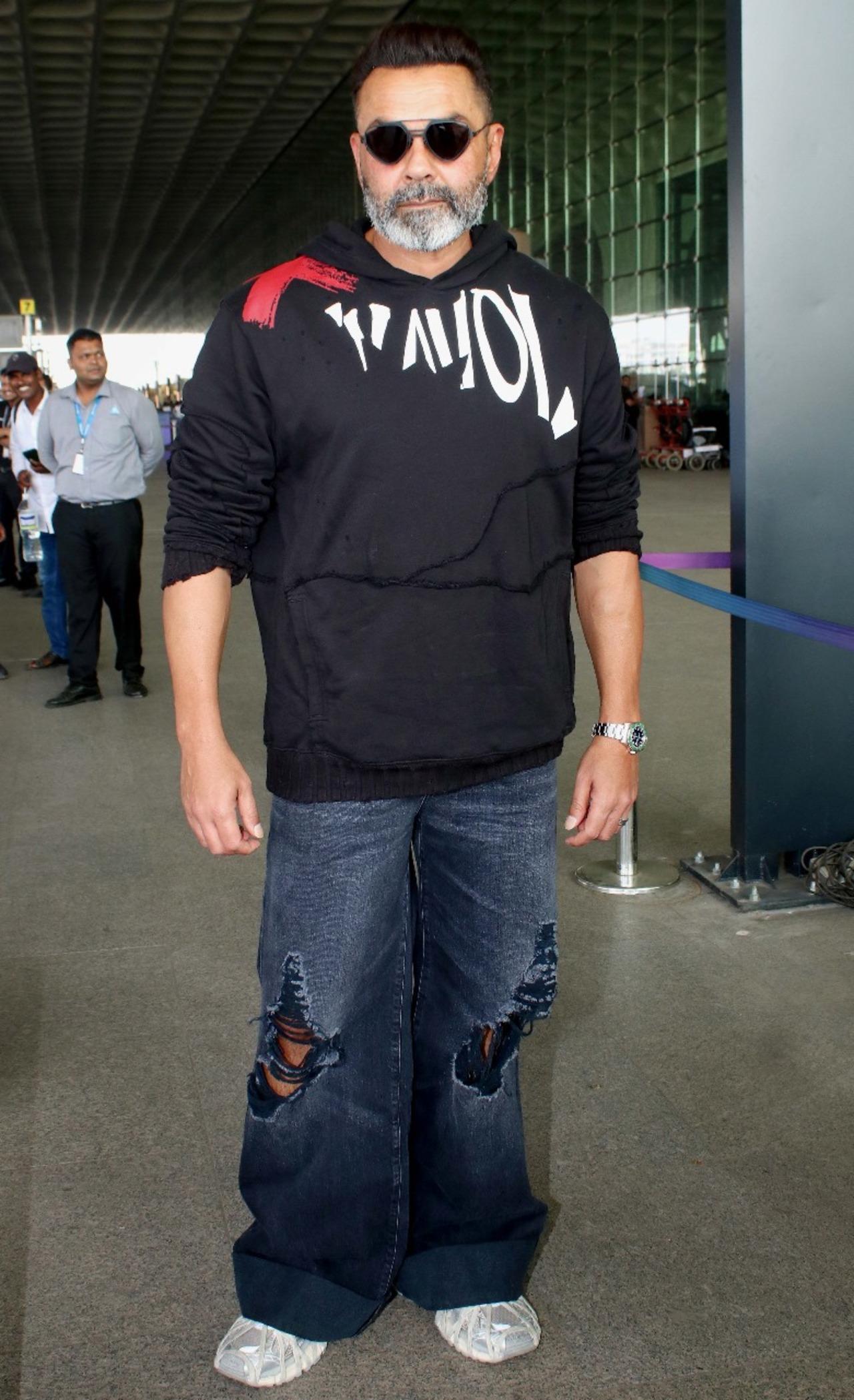 Bobby Deol was also spotted at the airport in a dapper look