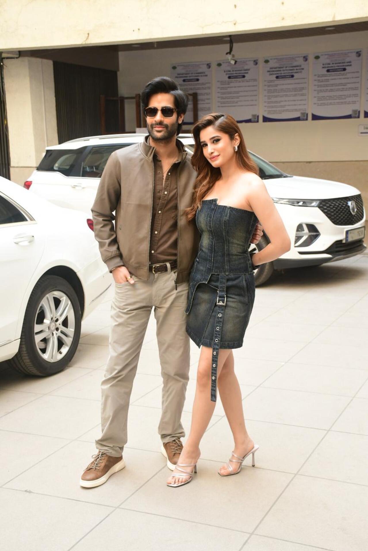 Newbies Rasha Thadani and Aaman Devgn pose for the paparazzi during the promotions of their film Azaad