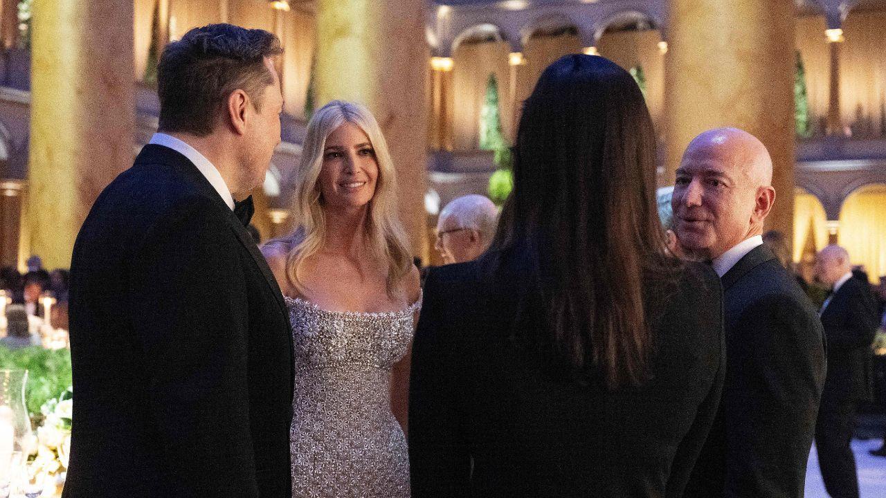He also thanked his supporters while addressing the gathering on the eve of his inauguration as the 47th US President
In Pic: Elon Musk (L), Ivanka Trump (2L) and Jeff Bezos (R) talk before US President-elect Donald Trump speaks at a candlelight dinner
