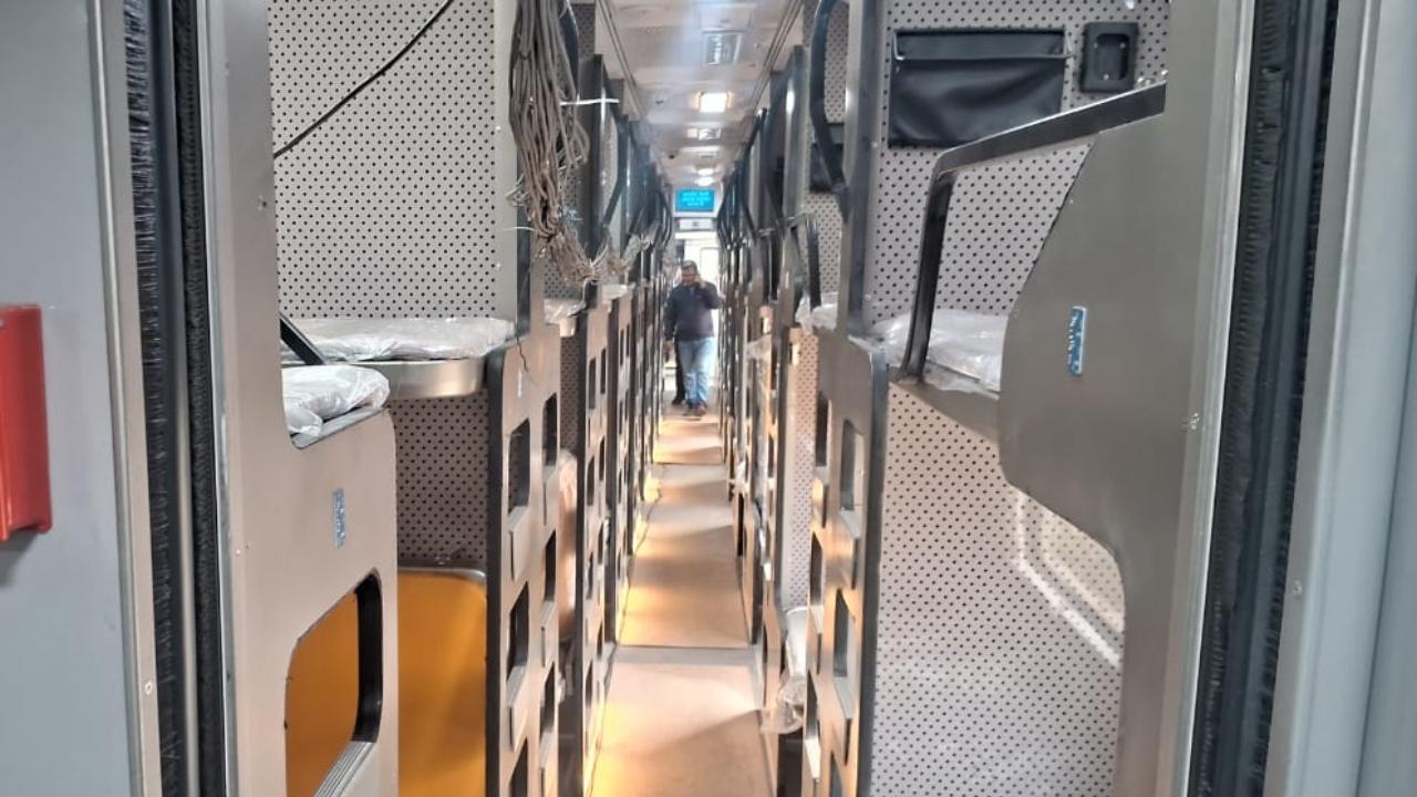It has a foldable snack table, an integrated lighting system, and a laptop charging setup