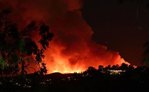 At least 18 individuals have been arrested on charges of looting and identity theft during the wildfire crisis, as per The New York Times. A mandatory evacuation order was issued by the Los Angeles Fire Department for the Palisades Fire region, including areas between Sunset Boulevard, Encino Reservoir, and Mandeville Canyon.