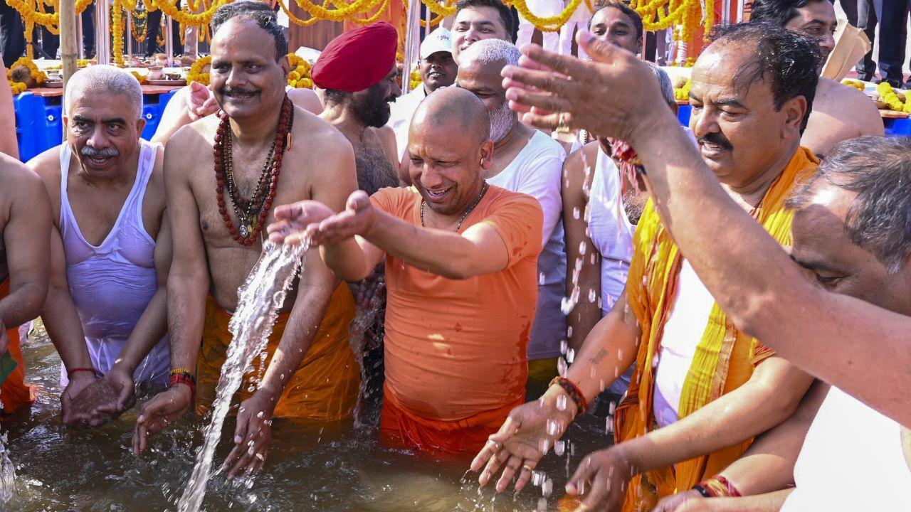 UP CM Yogi Adityanath and his cabinet colleagues take a holy dip in the Sangam at Maha Kumbh Mela 2025, in Prayagraj, on Wednesday. (Pics/PTI)