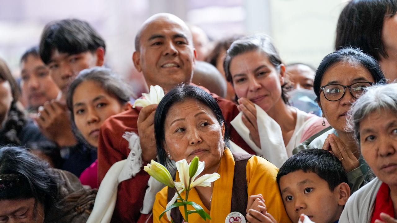 The birthday celebration was attended by thousands of people, including representatives of various Tibetan Buddhist sects, school children, dancers and singers from different countries, and Buddhists from across the world