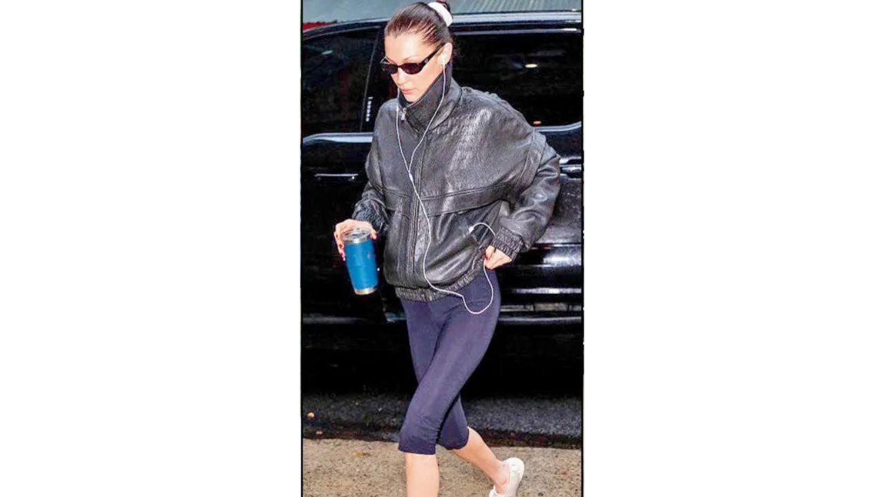 Bella Hadid gives off sports-luxe vibes with her silk bomber jacket (Pic Courtesy/@bellahadidbrasil)
Different vibes and styles
Casual: A timeless way to style capris is with a striped tee and ballet flats. For an edgier look, pair a cargo-style pair of pants with a boxy tee and chunky sneakers. Pedal pushers with bodysuits and silk bomber jackets can create a sports-luxe aesthetic
