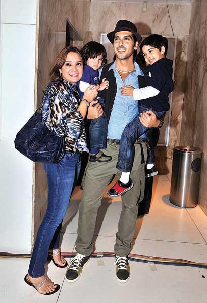 This throwback picture of the Khan family is pure gold. The way little Zidaan and Aariz cling to their daddy dearest is way too cute.