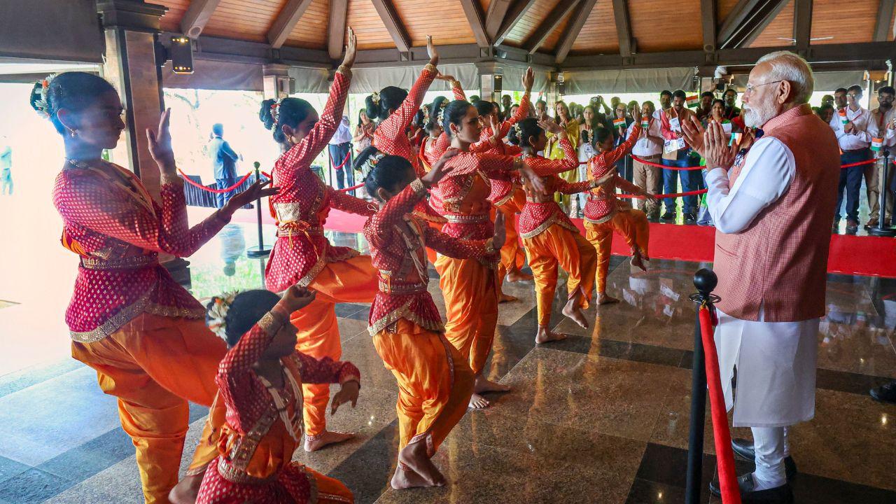Children performed a dance at the venue, where he was greeted by the Maldivian president.