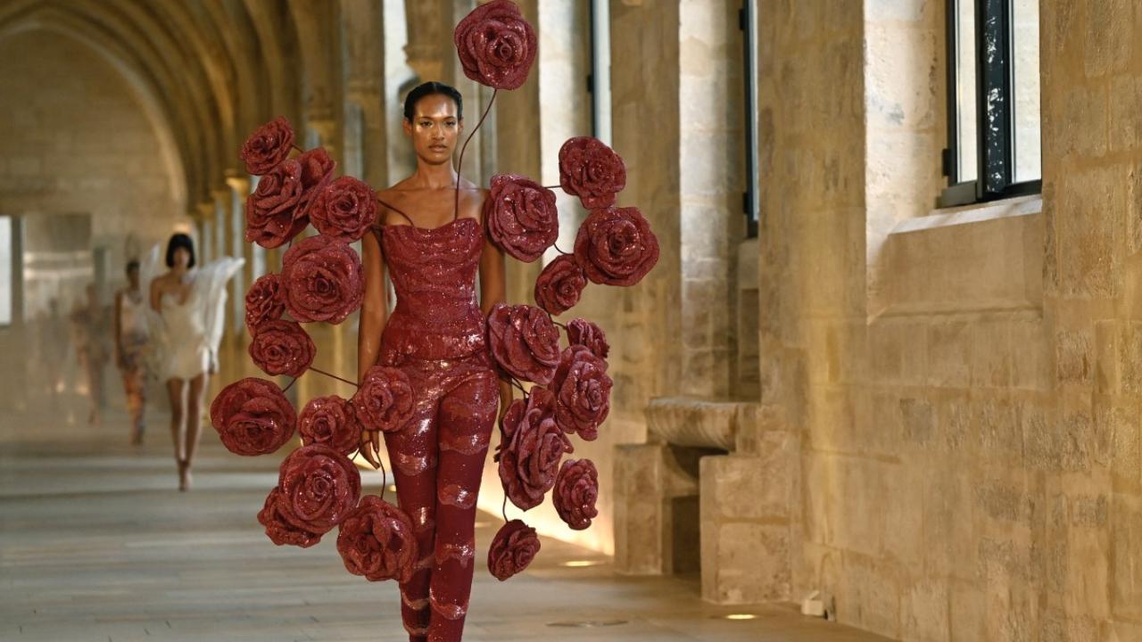 A model presents a creation by Rahul Mishra
Floral patterns dominate
Floral patterns were everywhere, with the rose especially dominant