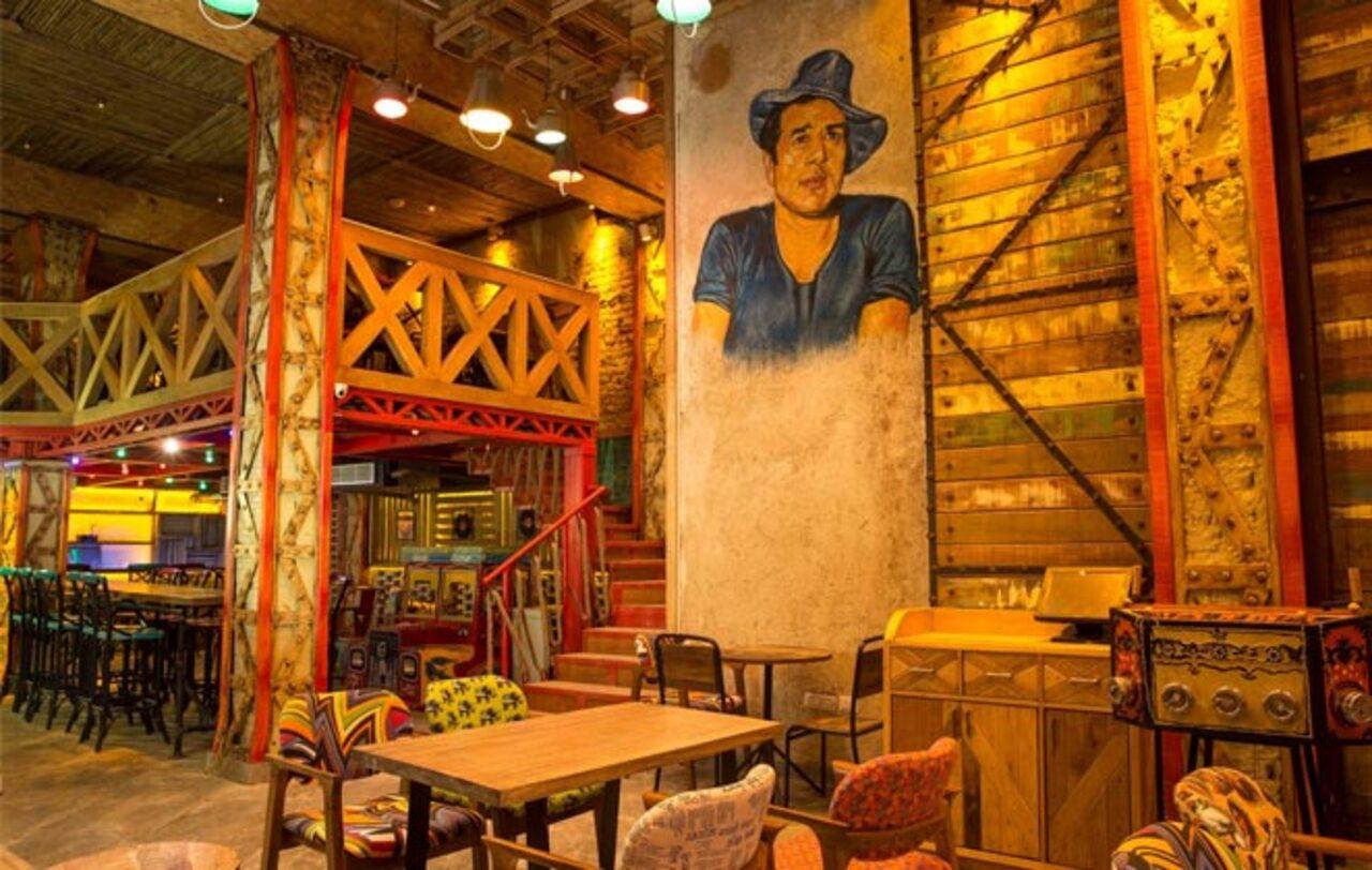 Veteran Bollywood actor Dharmendra is known for his restaurant venture 'Garam Dharam Dhaba.' It's a complete  Bollywood-themed restaurant celebrating his films, characters, and dialogues.