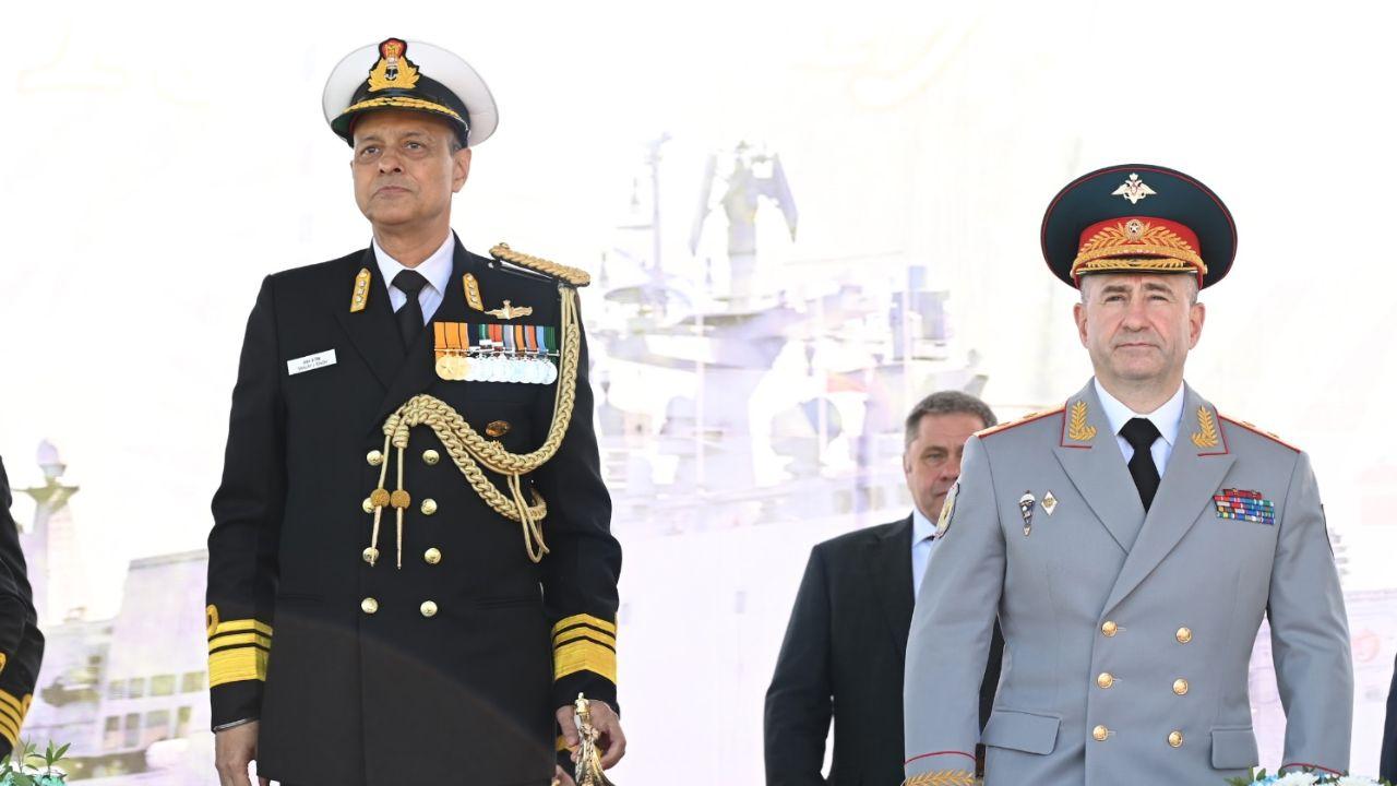 Chief Guest VAdm Sanjay Jasjit Singh tours INS Tamal with Capt Sridhar Tata, observing the ship’s advanced combat management systems and Indo-Russian tech integration.