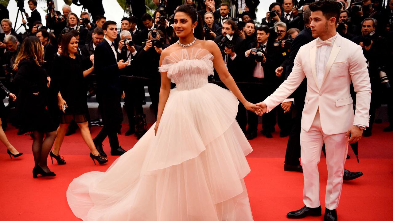 At Cannes 2019, Priyanka was a vision in white as she made an appearance in a white tulle gown, walking the red carpet alongside Nick Jonas, who also looked stylish in an all-white ensemble