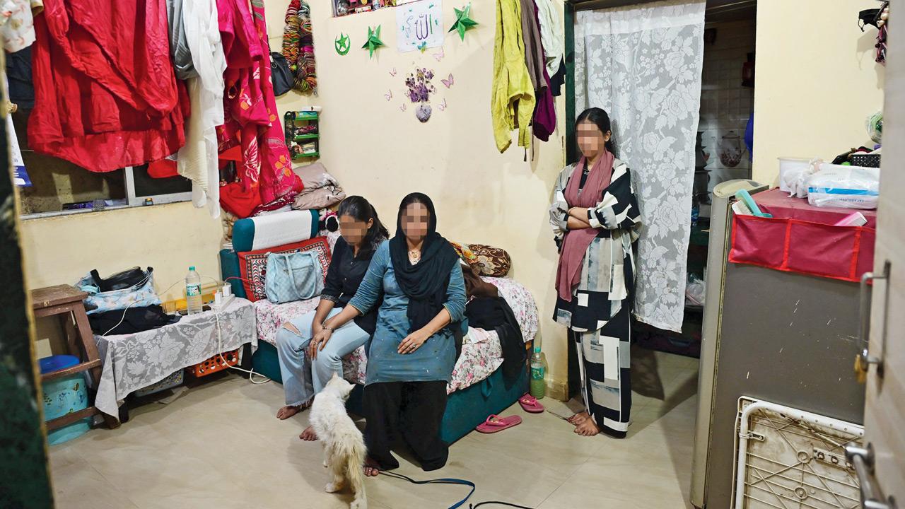 The mother (seated, right) and younger sisters of the 24-year-old woman at their Versova residence on Thursday. PIC/Nimesh Dave