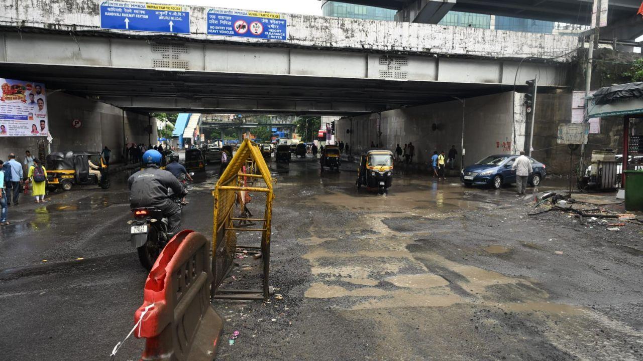 People expected to get relief from traffic snarls once the bridge was ready, but the potholes have made it dangerous