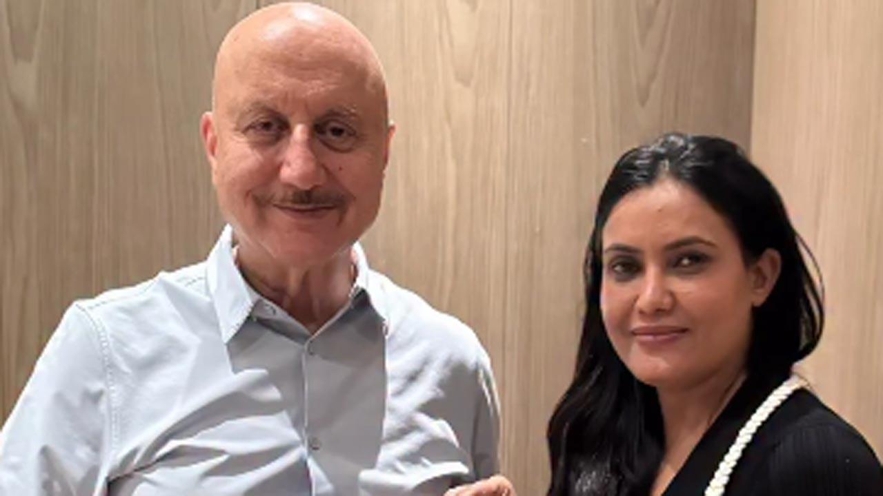Anupam Kher feels deeply honoured to present Col Sofiya Qureshi with his book