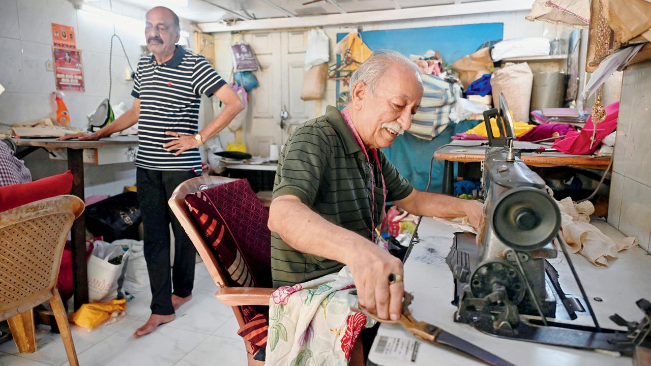 Ashok Solanki at his tailoring table