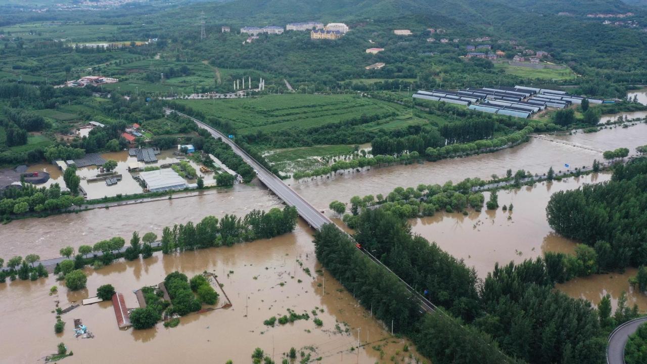 Authorities in Beijing have warned the public to stay away from fast-flowing rivers