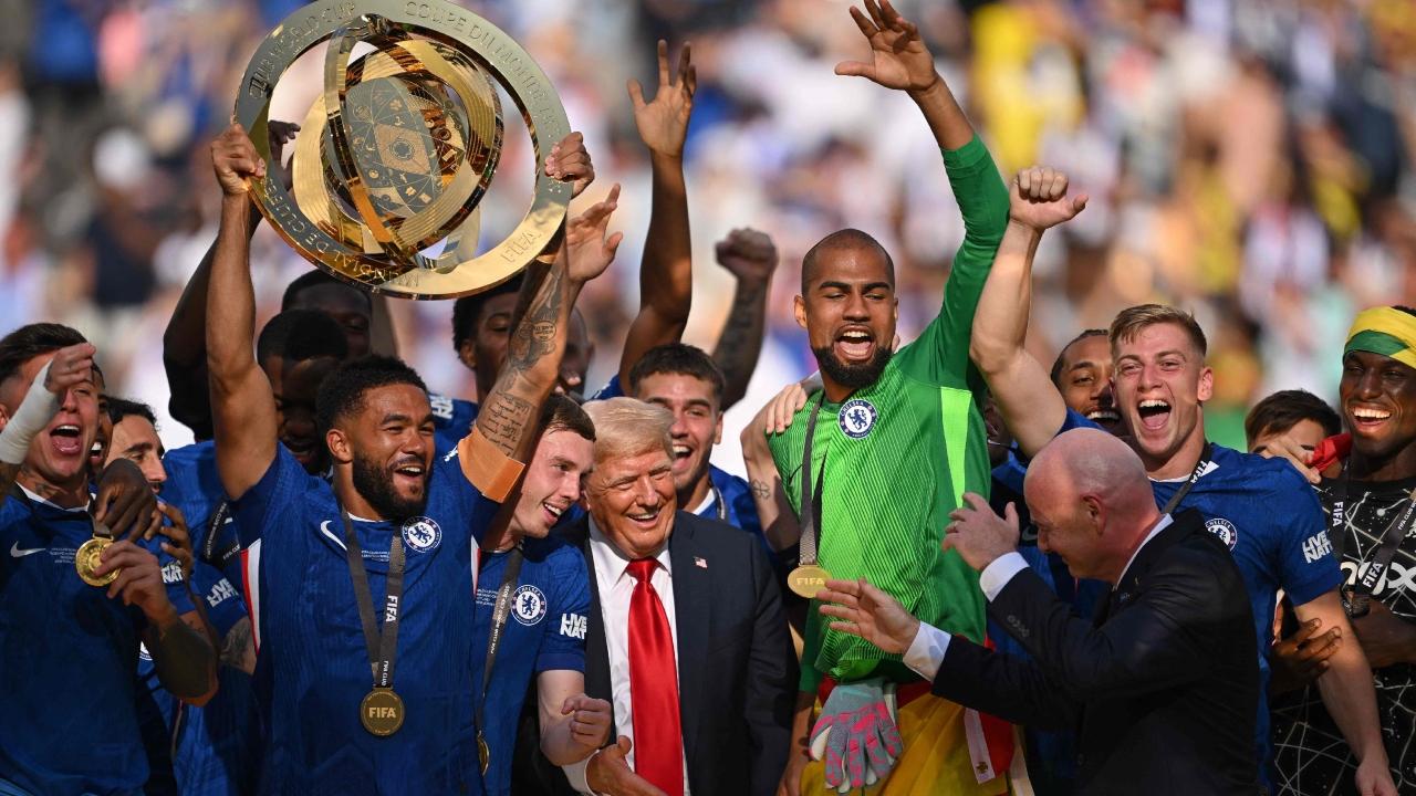 The president joined the players on the field after the match to congratulate the tournament's outstanding performers, present PSG players with their runner-up medals and hand Chelsea their championship trophy