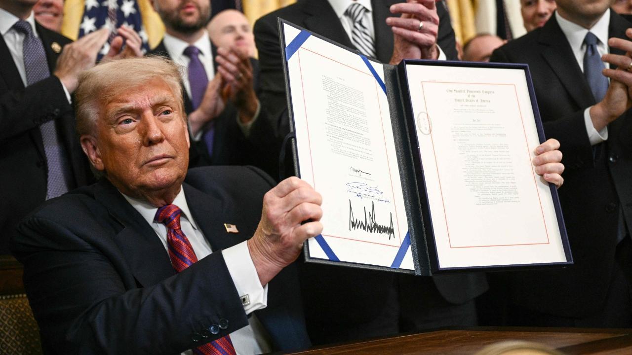 In Photos: US President Donald Trump signs the GENIUS Act