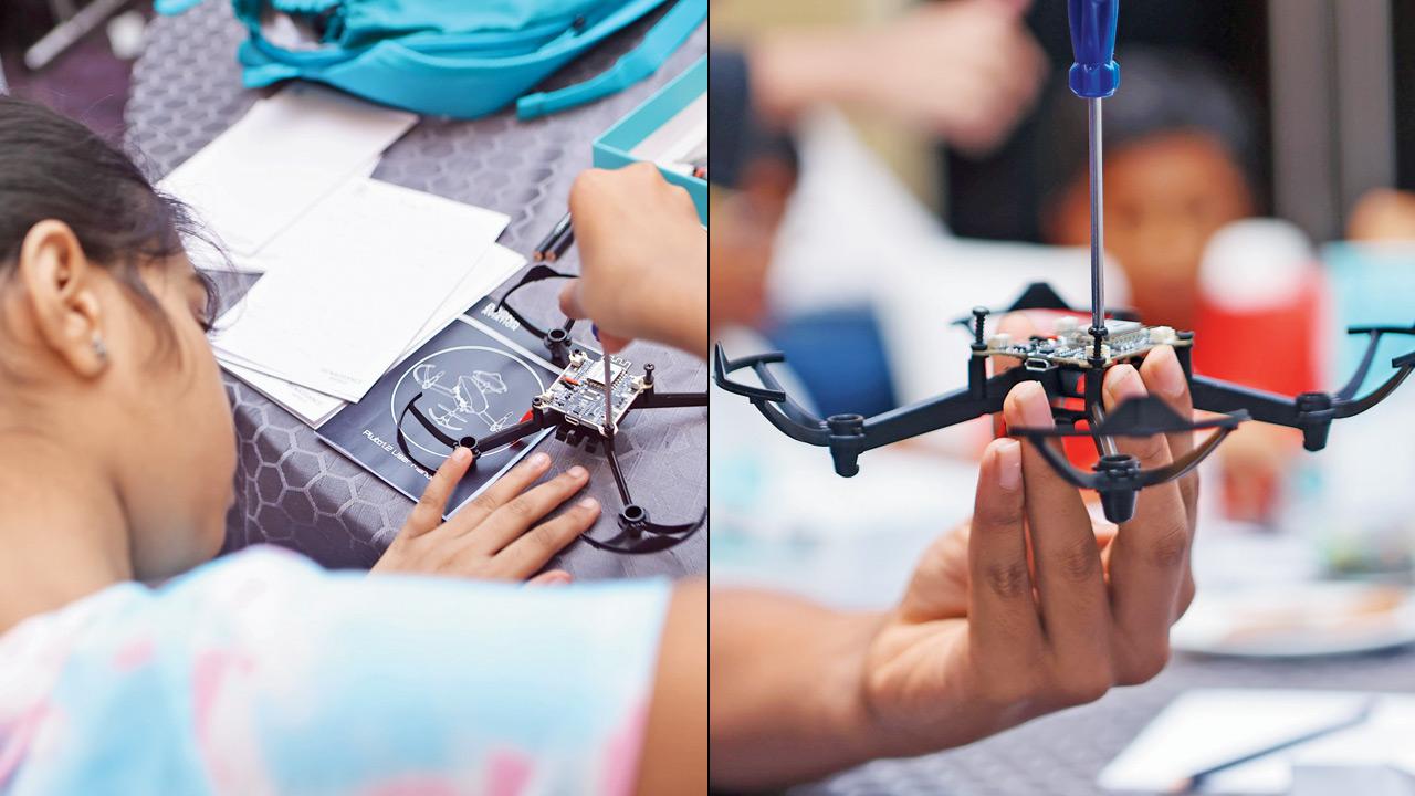 A participant builds a drone (right) A close-up of a drone mechanism