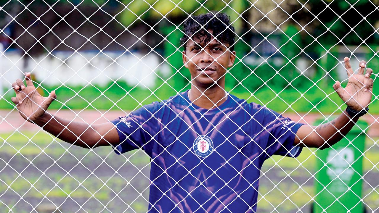 Mahadik behind a net