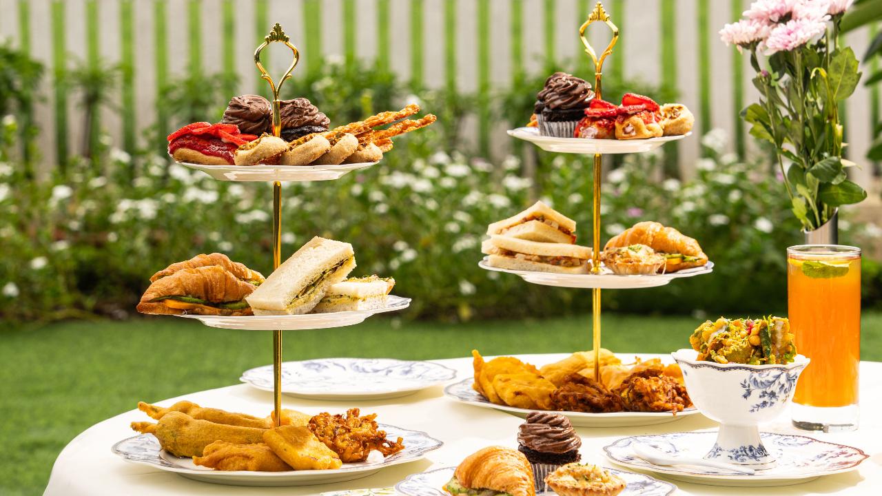 Under the cabanasAt the Mahalaxmi Racecourse, indulge in delicious food through their high tea menu in the Gallops Cabanas with dishes that include Avocado & Cheddar Croissant, Cheese Straws & Nankhatai, Hummus & Grilled Zucchini Sandwich, Palak Patta Chaat, Scotch Eggs, Pakodas & Bhajiyas, Mini Vada Pao, Cucumber & Cream Cheese Sandwich, Spinach & Corn Croquette, Fresh Fruit Tart, Spiced Carrot Cupcake, Kheema Puffs, Shrimp & Mayo Rolls, and Quinoa Bhel.
While you enjoy the delicious treats, you can also sip on some teas and refreshing beverages. 
Where: Gallops, Mahalaxmi Racecourse Time: 3 pm to 6 pm Price: Rs 1650 plus taxes for a single tea charlie that can serve two peopleCall: 022-6960011 and 8591093010 for reservations