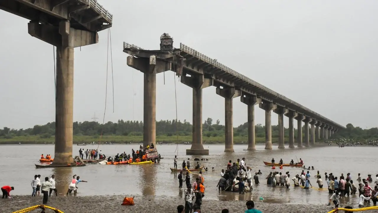 11 killed as vehicles fall into river after part of bridge collapses in Vadodara