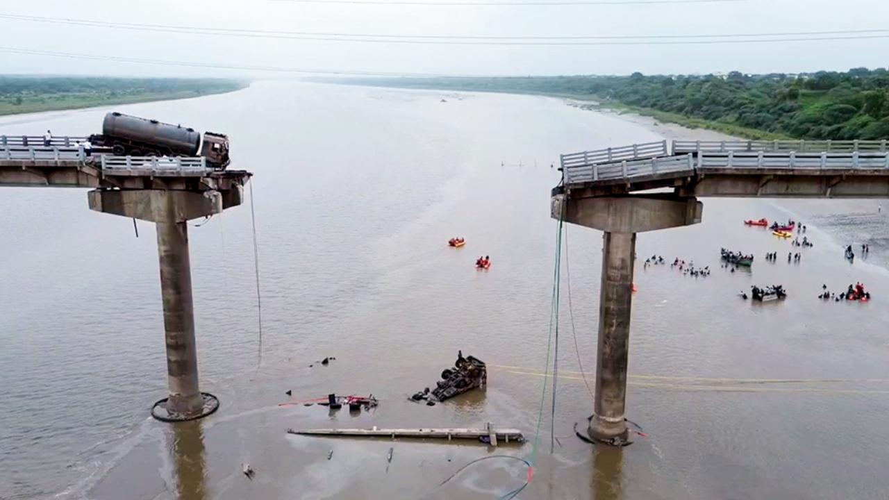 A slab of the Gambhira bridge, which connects central Gujarat to the Saurashtra region of the state, collapsed, killing eleven persons, Superintendent of Police (Vadodara rural) Rohan Anand said