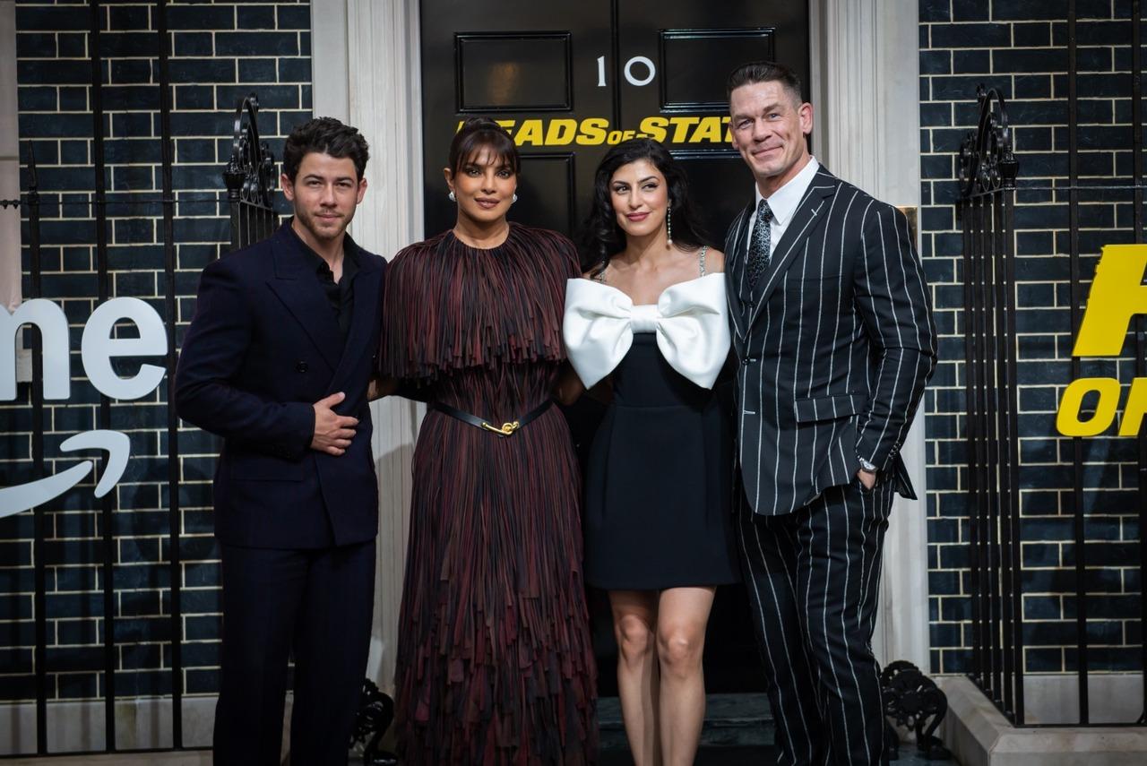 Stars and their plus-ones
Nick Jonas, Priyanka Chopra Jonas, Shay Shariatzadeh and John Cena line up in serious style for the Heads of State premiere. Black, white, stripes, bows — the fashion was firing on all fronts