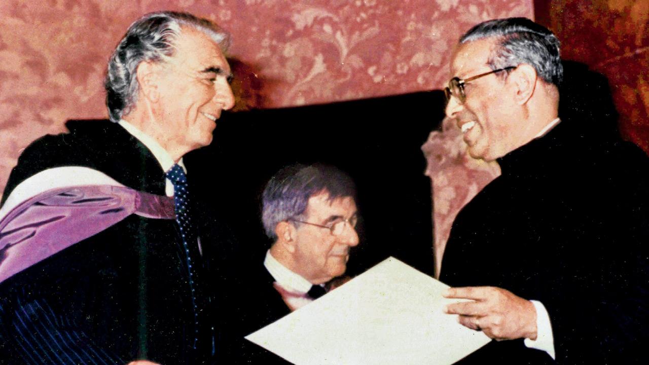 John Gomes (right) being conferred honorary membership at Trinity College of Music, 1967