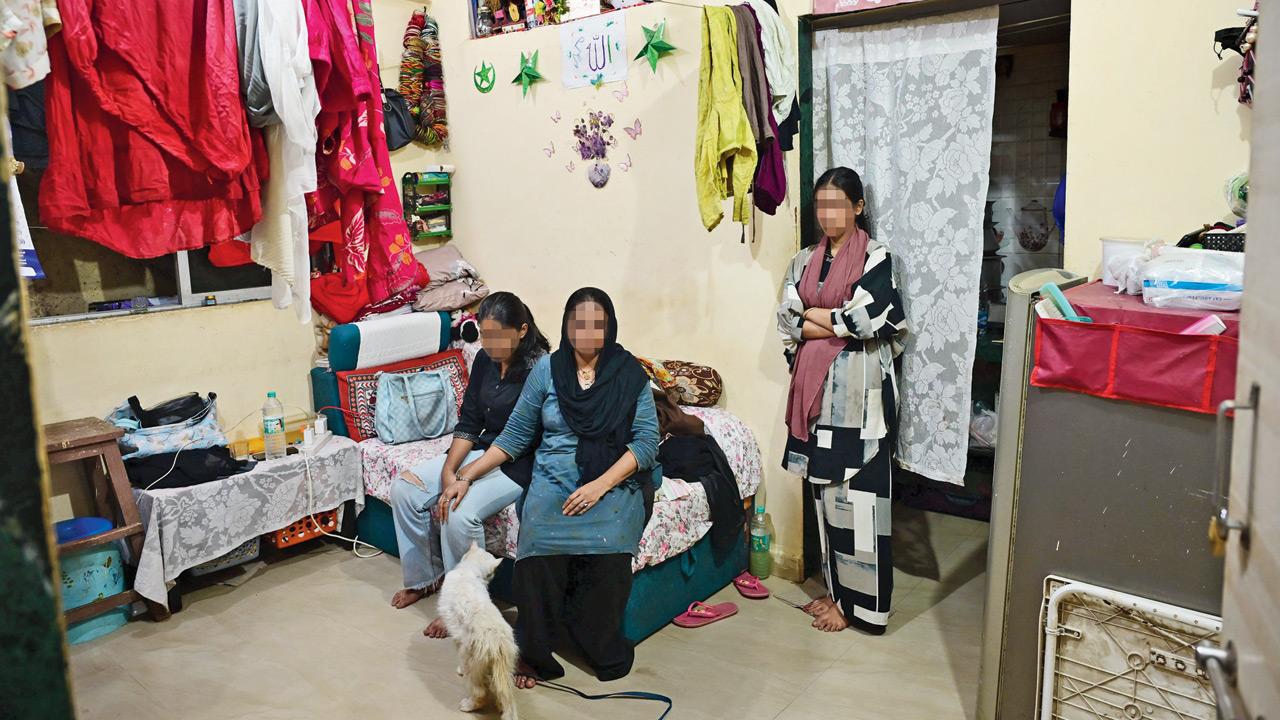 The mother (seated, right) and younger sisters of the 24-year-old woman at their Versova residence on Thursday. PICS/NIMESH DAVE