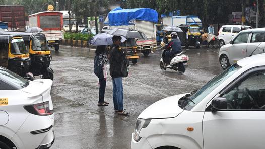 Mumbai rains disrupt local train services; police advise caution
