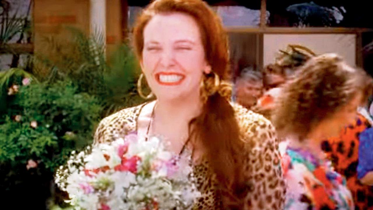 A moment from Muriel’s Wedding.  Pic Courtesy/Altitude Films on YouTube
