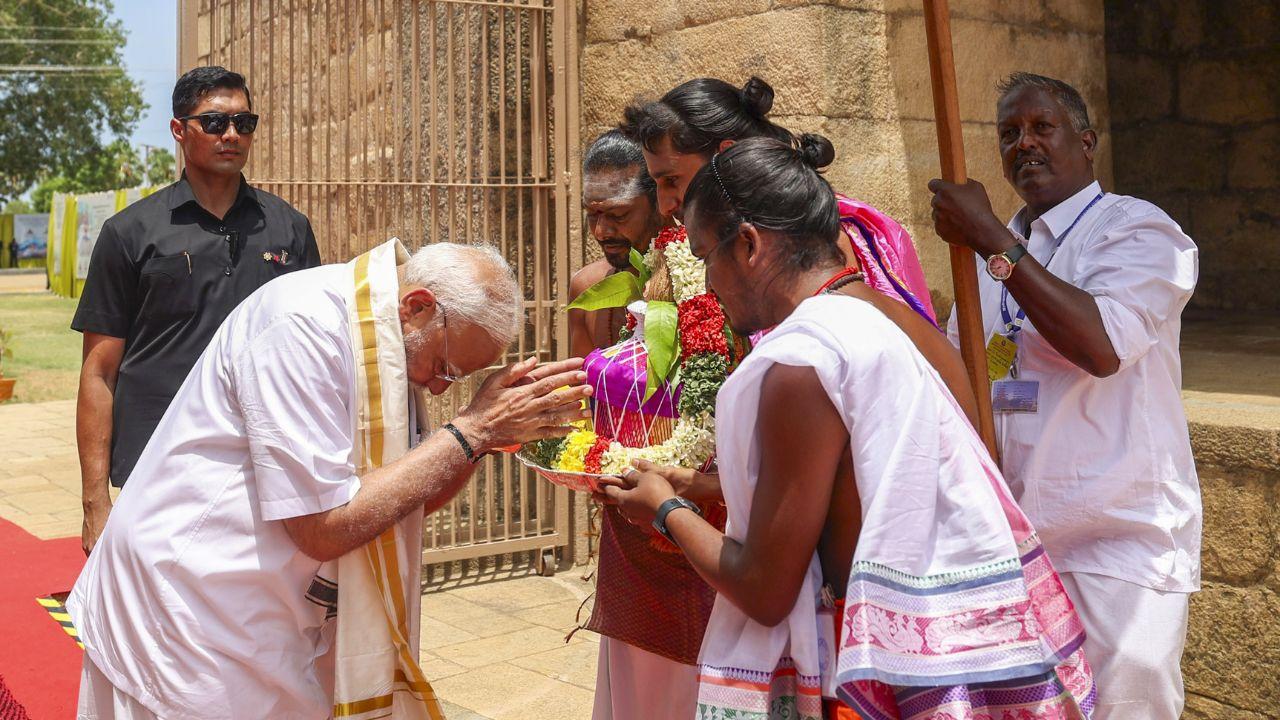The Prime Minister was welcomed by local priests at the temple
